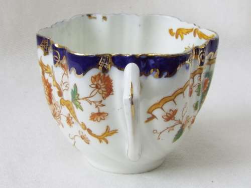 Antique  gilded porcelain transfer ware and hand embellished Cup and Saucer Ref. C-106
