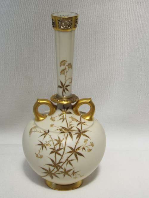 A 19th century Royal Worcester Bud Vase, decorated with gilded foliate sprays Dated 1885. Ref OR/43