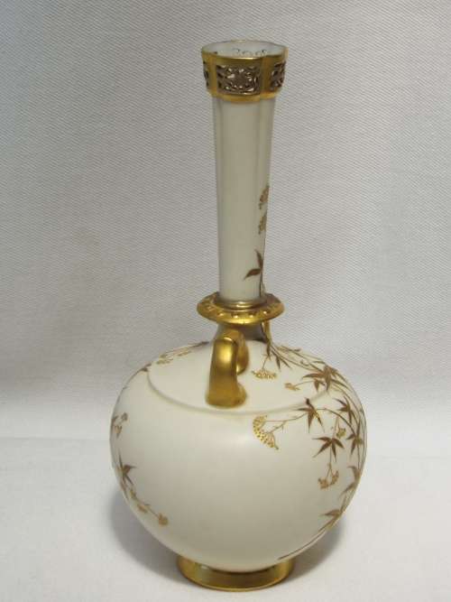 A 19th century Royal Worcester Bud Vase, decorated with gilded foliate sprays Dated 1885. Ref OR/43