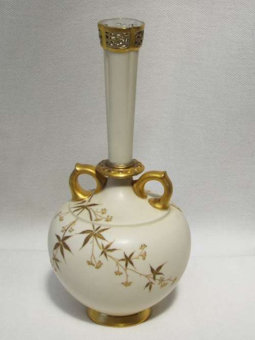 A 19th century Royal Worcester Bud Vase, decorated with gilded foliate sprays Dated 1885. Ref OR/43