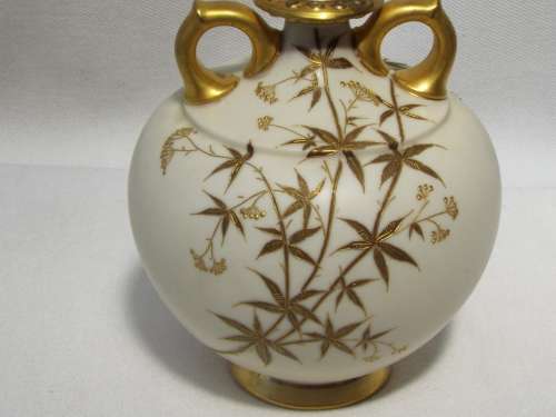A 19th century Royal Worcester Bud Vase, decorated with gilded foliate sprays Dated 1885. Ref OR/43