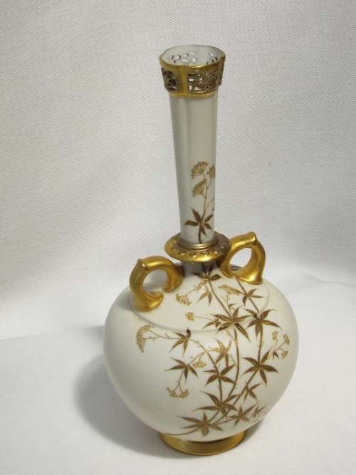 A 19th century Royal Worcester Bud Vase, decorated with gilded foliate sprays Dated 1885. Ref OR/43