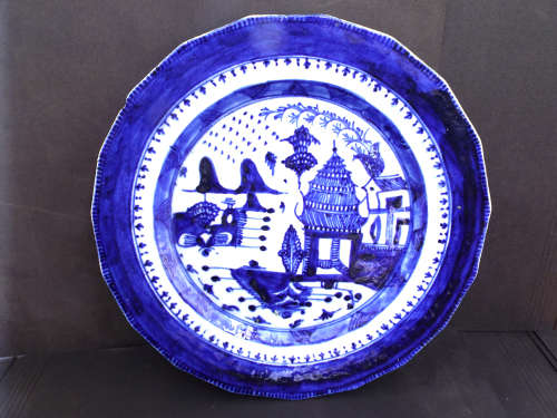 A Chinese signed porcelain Pagoda design Quinlong Plate. Ref. P/93
