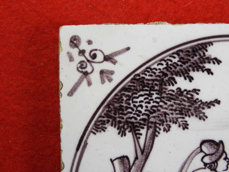 A rare `Bristol` manganese coloured `Delft` wall tile Ref.#CL-9
