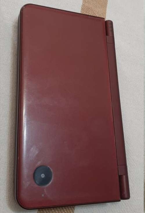 Nintendo Dsi Xl| 7 Games| Stylus|  Original Box and manuals| Charger| 2gb SD Card