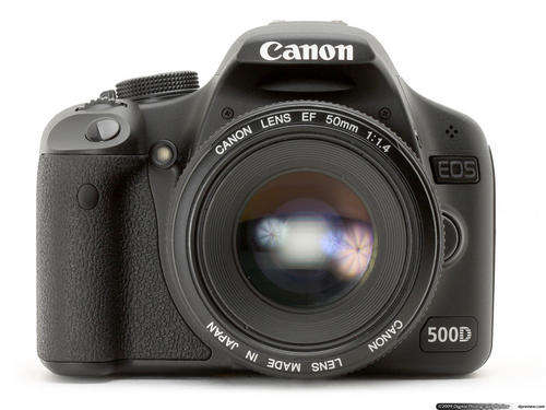 Canon 500D 15.1 MP Digital SLR Camera + 100-300mm Lens and MORE