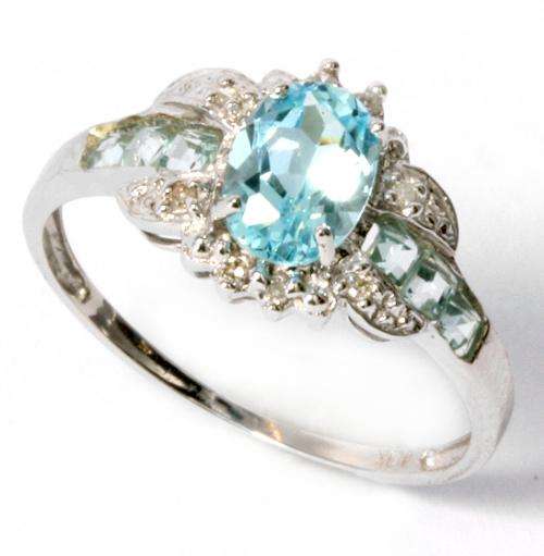 ***R3200*** RING WITH 7 SKY BLUE TOPAZ & 8 DIAMONDS IN 9KT WHITE GOLD (price reduced)
