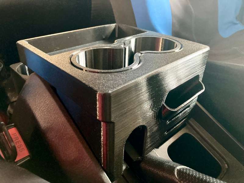 Mahindra centre console cup/holders