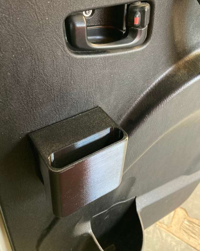 Mahindra centre console cup/holders
