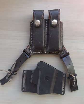 GLOCK HOLSTER AND A  MAGAZINE HOLDER