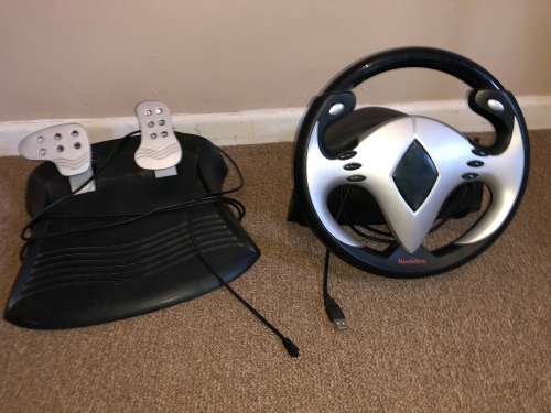 Steering wheel with Pedals (Sold as is. Please read.)