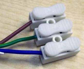 Triple-Wire Spring Push Down Connector. Collections are allowed.