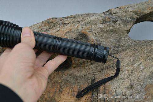 Rechargeable LED Flashlight Torch and Electric Shock Stun Gun. Collections are allowed.