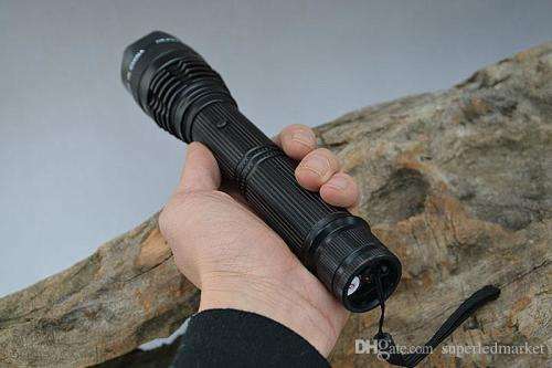Rechargeable LED Flashlight Torch and Electric Shock Stun Gun. Collections are allowed.