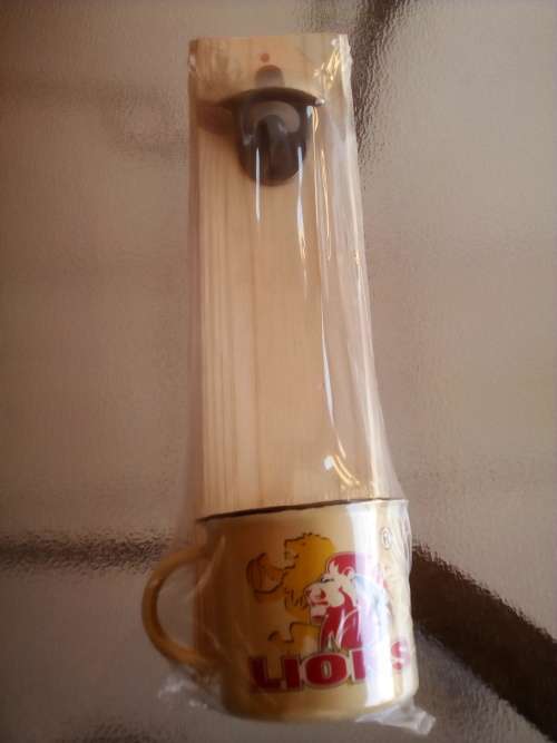 LIONS RUGBY WALL MOUNT BOTTLE OPENER + ENAMEL CUP GIFT PACK. Collections are allowed.