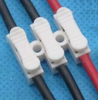 Triple-Wire Spring Push Down Connector. Collections are allowed.