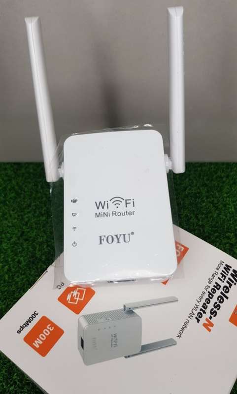 Wireless-N WiFi Repeater Mini Router / Range Extender for All WLAN Networks. Collections are allowed