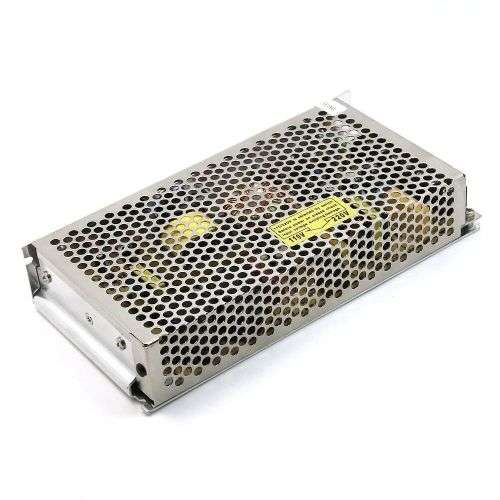 AC To DC Transformer / Regulated Switching Power Supply Universal Adaptor. Collections are allowed.
