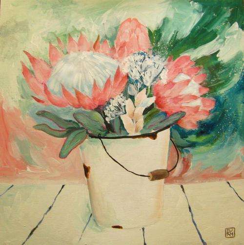 proteas in an enamel bucket