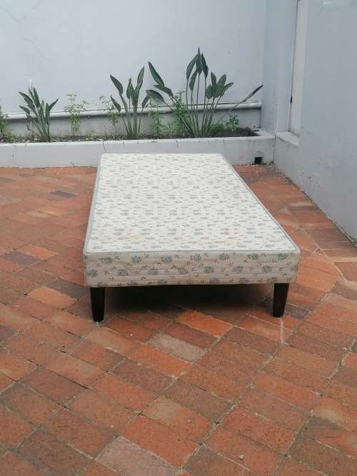 Single Bed Base with wooden feet.