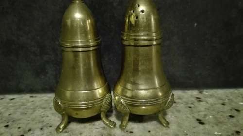 Brass salt and pepper pots.