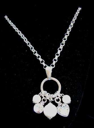 Detachable pendant with multiple charms on chain necklace