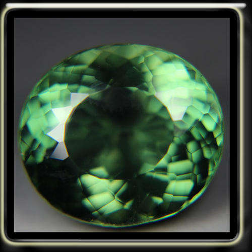 20.65CT BREATHTAKING DARK GREEN AMETHYST TREATED QUARTZ PERFECTLY POLISHED IN A OVAL
