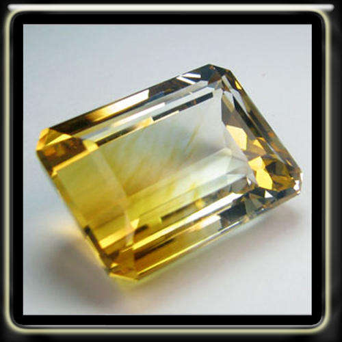 MODERN 23.65CT BI-COLOUR WHITE AND YELLOW QUARTZ CUT IN A PERFECT OCTAGON