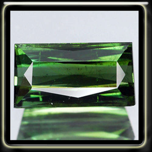 RARE 1.27CT 100% NATURAL LEAF GREEN TOURMALINE POISHED IN A SCISSOR CUT GEMSTONE
