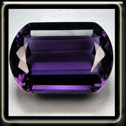EXCLUSIVE 20.85CT PASSIONATE DARK PURPLE AMETHYST, A FANCY CUT GEMSTONE
