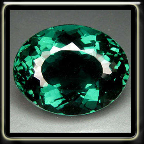 LOVELY 13.70CT LIVELY GREEN INDICOLITE TOURMALINE QUARTZ IN A MODERN OVAL GEMSTONE