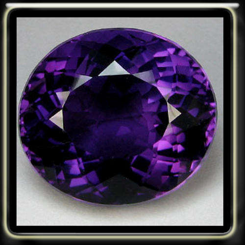 EXCLUSIVE 22.10CT ROYAL DARK PURPLE AMETHYST, A OVAL CUT GEMSTONE
