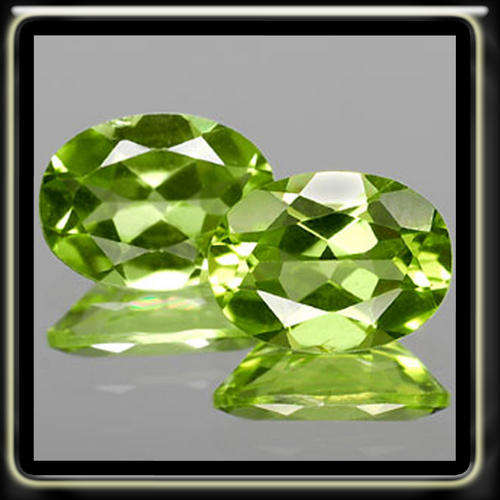1.00CT PAIR NATURAL UNHEATED BRIGHT GREEN PERIDOTS POLISHED IN OVAL GEMSTONES