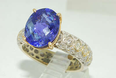 R120000 6.54 CT HUGE OVAL CUT AAA TANZANITE & DIAMOND RING