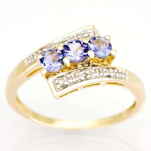 R36800 - ELEGANT 9K GOLD 0.81CT NATURAL TANZANITE & DIAMOND RING