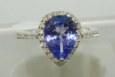 R84521 - 2.47CT PEAR SHAPED TANZANITE & DIAMOND RING
