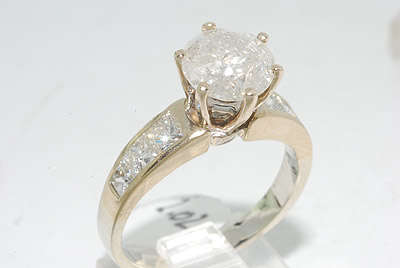 R120000 2.93CT 7 STONE 18K GOLD DIAMOND ENGAGEMENT RING