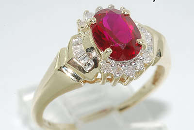 R57425 - 2.38CT OVAL CUT RUBY & DIAMOND RING