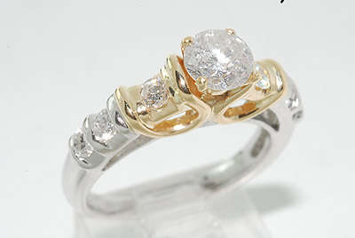 R90000 1.08CT PLATINUM & 18K DIAMOND ENGAGEMENT RING