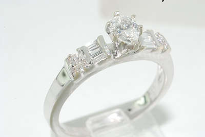 R40000 AMAZING .52CT PEAR CUT DIAMOND ENGAGEMENT RING