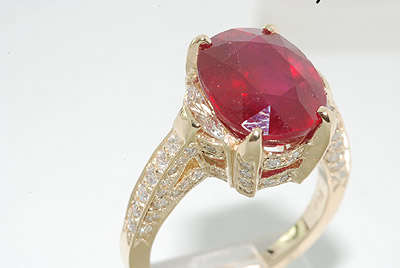 R80000 MAGNIFICENT 6.47CT OVAL CUT RUBY & DIAMOND RING