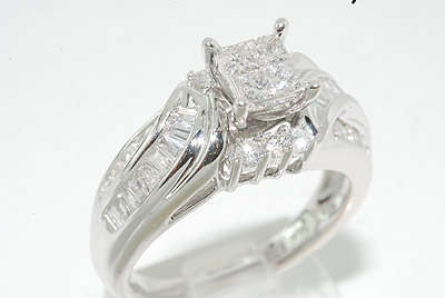 R85000 1.29CT PRINCESS,BAGUETTE & ROUND CUT DIAMOND RING