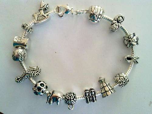 ***CUTE*** pack of 15 tibetan silver  pardora charms/beads