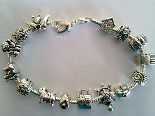 ***CUTE*** pack of 15 tibetan silver  pardora charms/beads