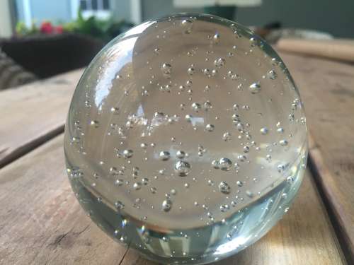 Beautiful clear sphere paperweight with bubbles
