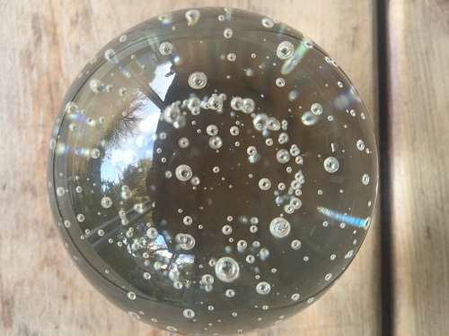 Beautiful clear sphere paperweight with bubbles