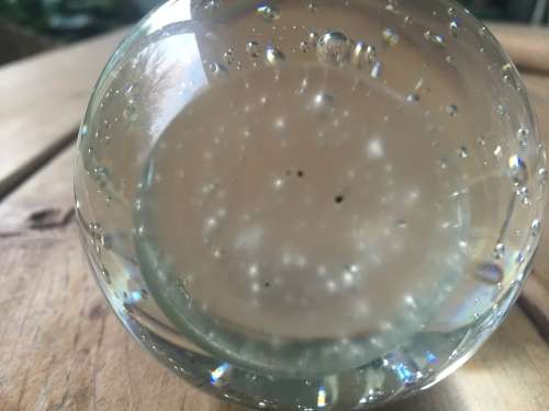 Beautiful clear sphere paperweight with bubbles