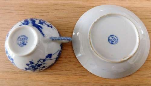Oriental blue and white eggshell cup and saucer