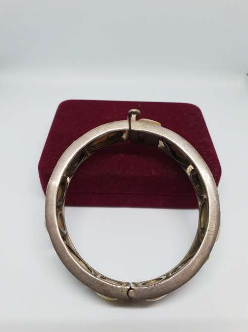 Vintage Sterling bangle with white stones (possibly mother of pearl)