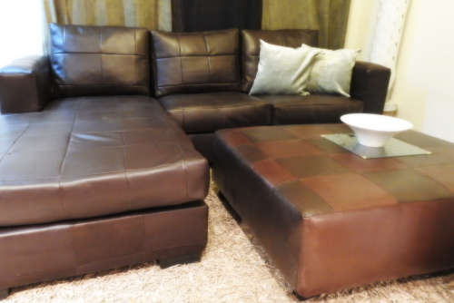 MASSIVE DISCOUNT!! BUY NOW & SAVE!! - Bonded Leather Corner Lounge with Xlarge Matching Coffee Table